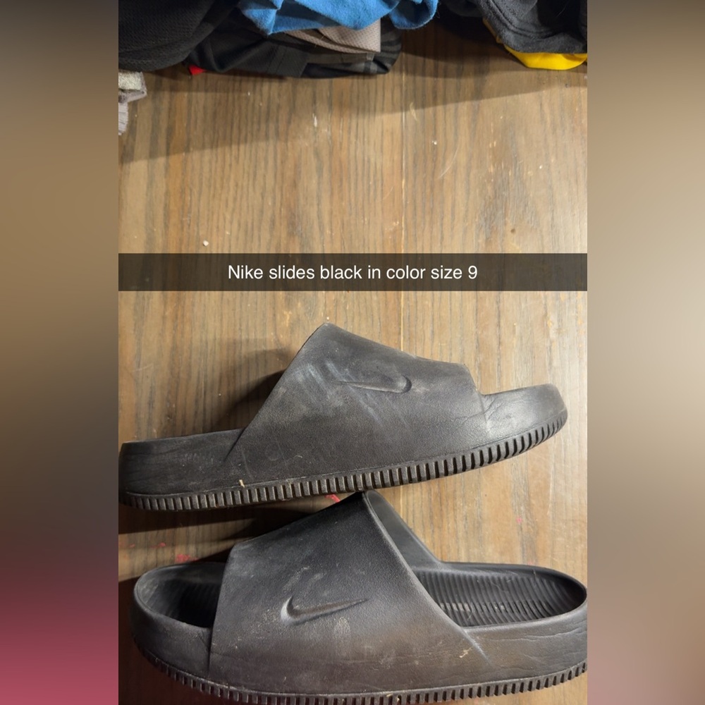 Nike Black Sandals with Swoosh Logo and Textured Footbed